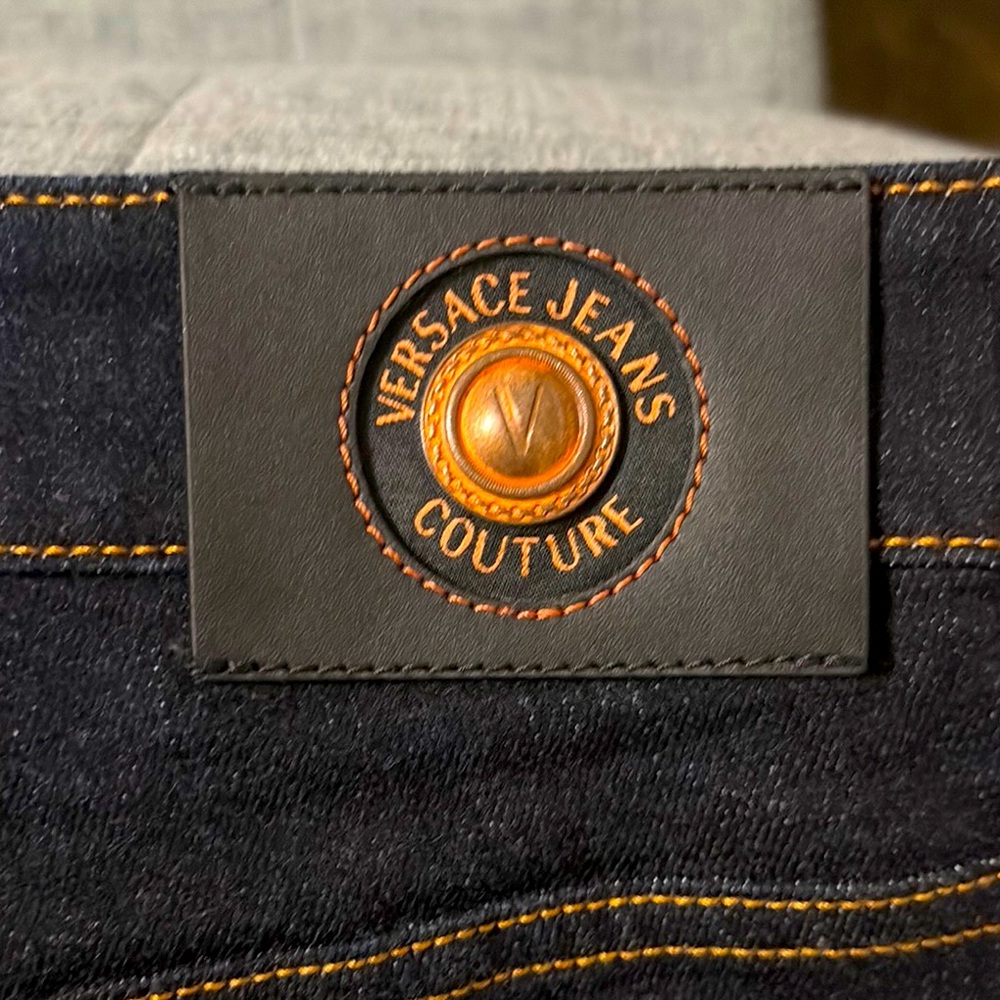 NWT Versace Couture navy jeans with orange-gold stitching
